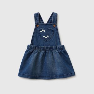 Saia jardineira efeito denim
