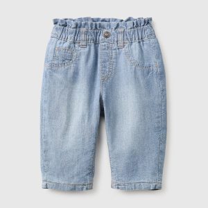 Calças em chambray com cintura subida franzida