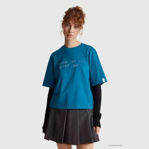 Teal t-shirt with Coco Capitán print