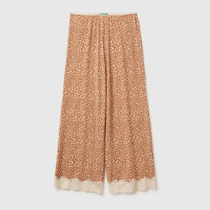Calças animalier com renda
