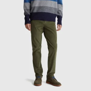 Calças slim fit em veludo stretch
